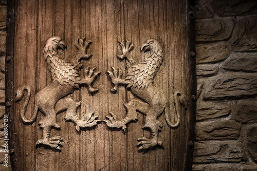 engraved image of Griffin or griffon a legendary creature with the body of a lion, the head and wings of an eagle