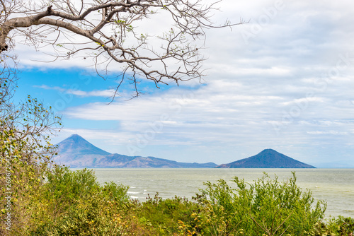 View at the Volcanos Momotombo and Momotombito with Xolotlan lake in Nicaragua photo