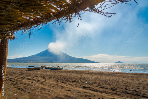 View at the Volcanos Momotombo and Momotombito with Xolotlan lake in Nicaragua photo