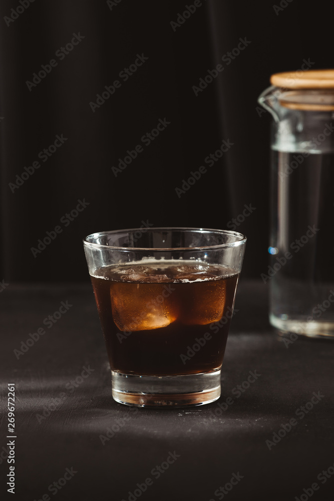 Iced coffee or cold brew coffee in a glass Iced coffee or cold brew coffee in a glass