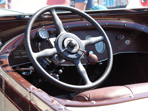 The steering wheel of an old car of the early twentieth century