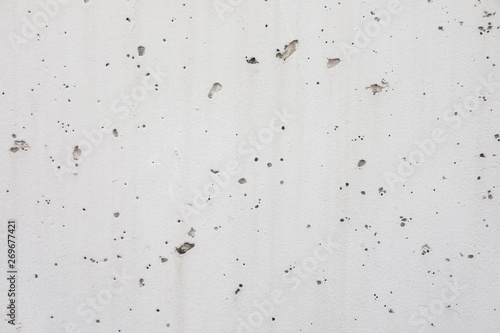 Bright concrete wall with splashes