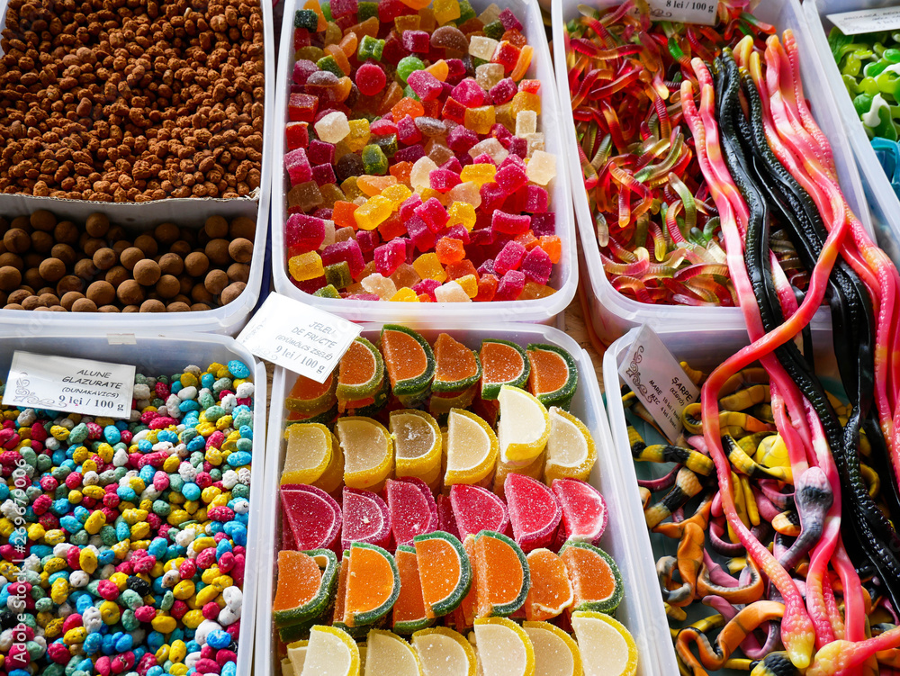 Variety of colorful jelly sweets and goodies at local fair.
