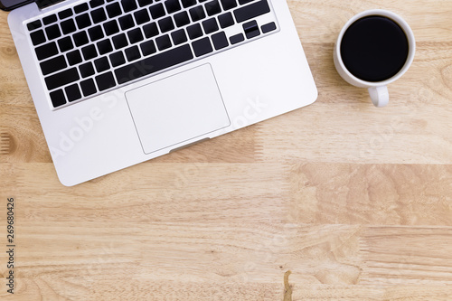 flat lay Office desk table of modern workplace with laptop on wooden table, top view laptop background and copy space on wooden background, White desk office with laptop, laptop background