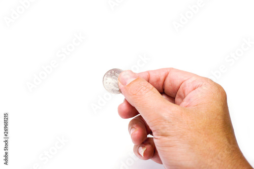 Image of hand picking up a 100 Japan Yen currency coins isolate on white background and make with paths.