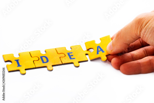 Photography The word idea created with pieces of puzzle like concept for creativity, creativ