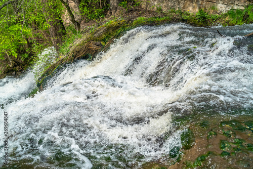 Mountain river waterfall landscape. View from top of Dzhurynskyi waterfall stream. Nyrkiv  Ukraine