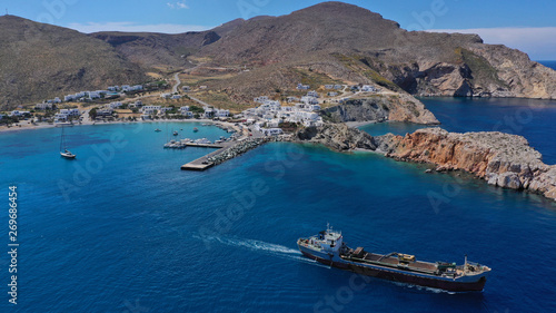 Aerial drone photo of Karavostasis picturesque main port of Folegandros island featuring sandy pebble beach, Cyclades, Greece