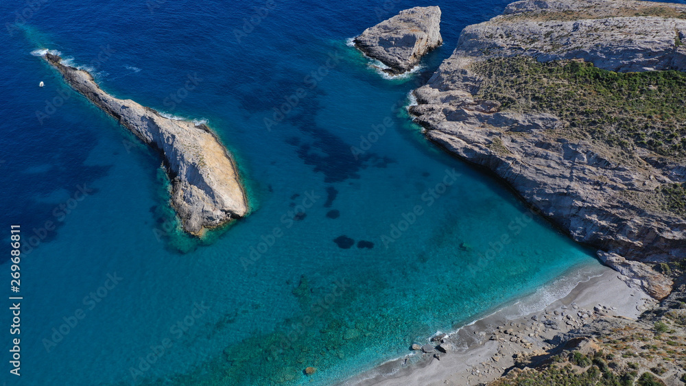 Aerial drone photo of iconic deep turquoise beach of Katergo with crystal clear sea and sandy sea shore, Folegandros island, Cyclades, Greece