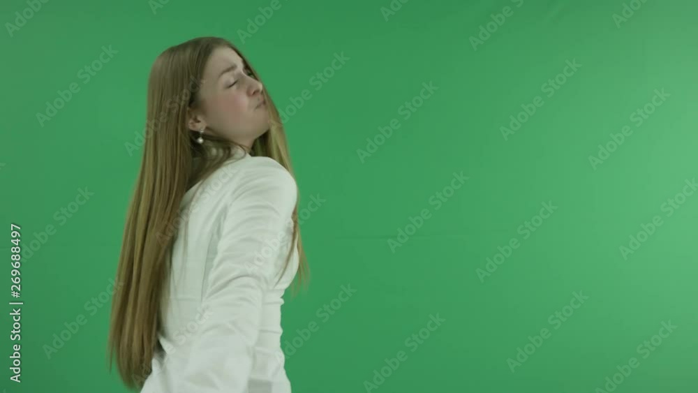 Excited young business woman is leading the way and pointing something. She shows something on the green screen Excited young business woman is leading the way and pointing something. She shows something on the green screen