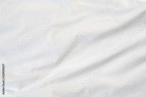 Texture of White blanket crumpled on the bed
