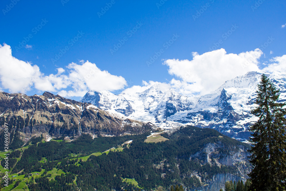 Swiss Alps. Alpine mountains. Mountain landscape. Tourist photo. Spring in the Alps