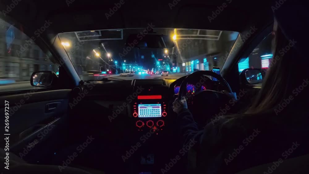 The girl drives the car. Timelapse of the right-hand drive car. 4k wide angle video from RAW photos. Hyperlapse roads at night. Accelerated video from the car. The girl drives the car. Timelapse of the right-hand drive car. 4k wide angle video from RAW photos. Hyperlapse roads at night. Accelerated video from the car.