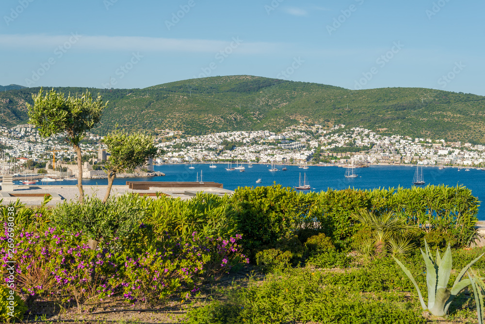 Bodrum, Turkey - panorama of Bodrum city. White houses, harbour and hills in the background