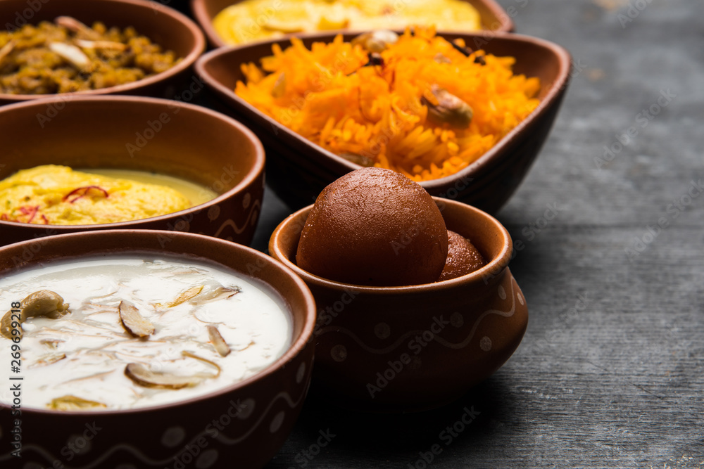 group of Indian Sweet / mithai in terracotta bowl group of Indian Sweet / mithai in terracotta bowl