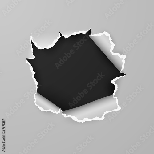 Torn hole in sheet of paper with black background with space for text. Vector illustration