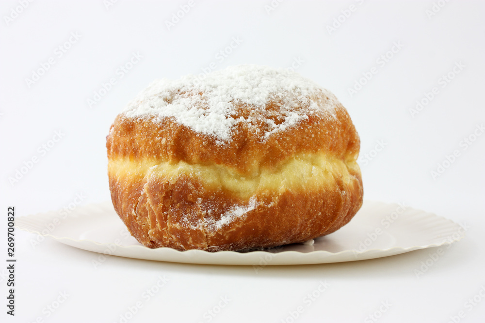 donut on plate isolated on white background donut on plate isolated on white background