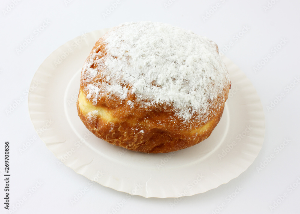 donut on plate isolated on white background donut on plate isolated on white background