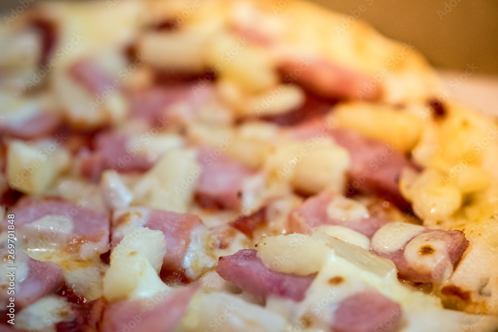 Delicious ham and pineapple pizza with cheese