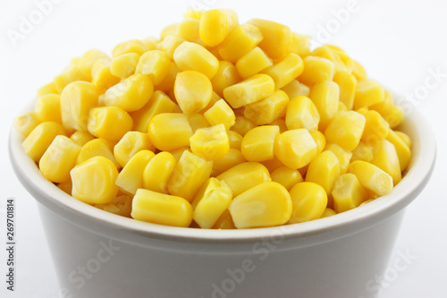corn in a bowl isolated on white background