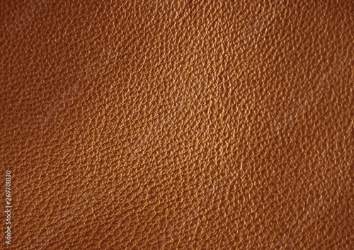  Texture of genuine leather. Brown color background.