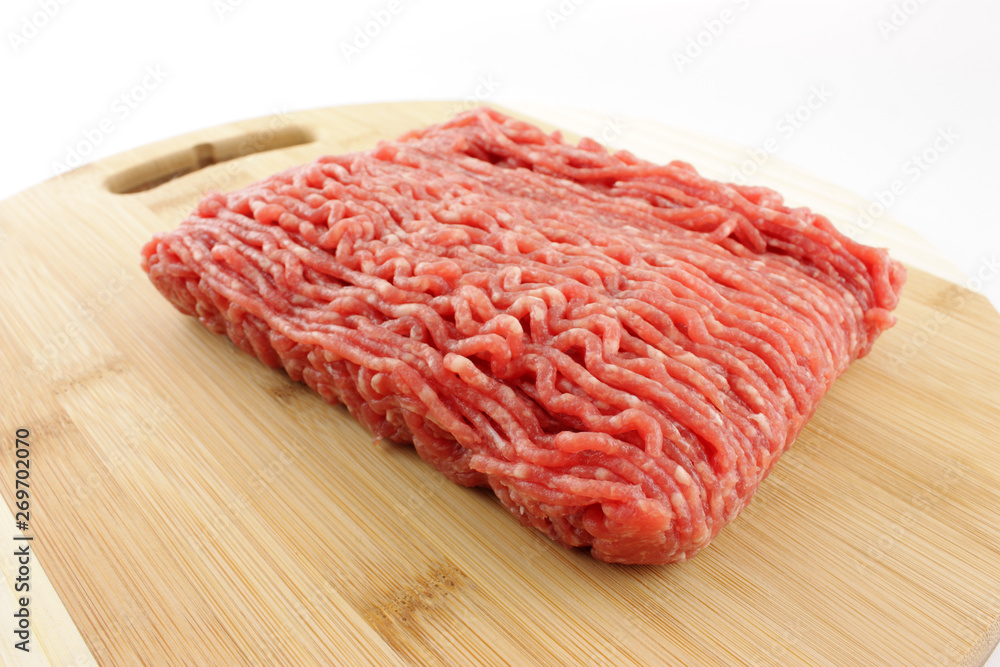 raw minced meat on a cutting board raw minced meat on a cutting board