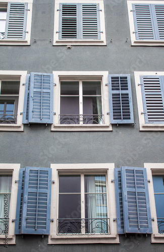 Zurich architecture. The facade of the house. Windows with shutters. Zurich Streets