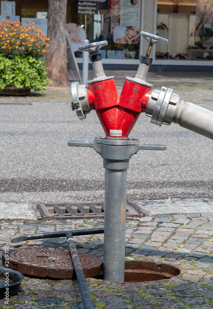 Red fire hydrant from the open hatch. Red fire hydrant from the open hatch.
