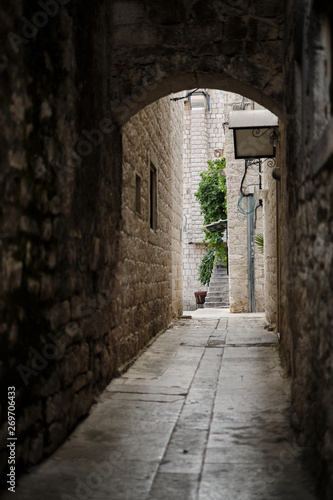 Old and empty medieval street in Trogir, Croatia
