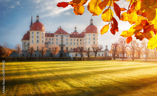 Wonderful Autumn Landscape during sunset. Amazing View of Moritzburg Castle near Dresden, Saxony, Germany under sunlit, during autumn morning. Instagram filter. Greative image. Postcard. photo