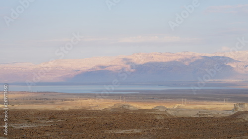 Landscape with desert and Dead Sea in Israel at sunset.