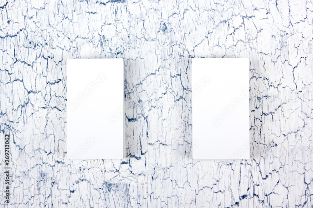 Blank business cards on the wooden table. Template for ID. Top view. Top view. Blank business cards on the wooden table. Template for ID. Top view. Top view.