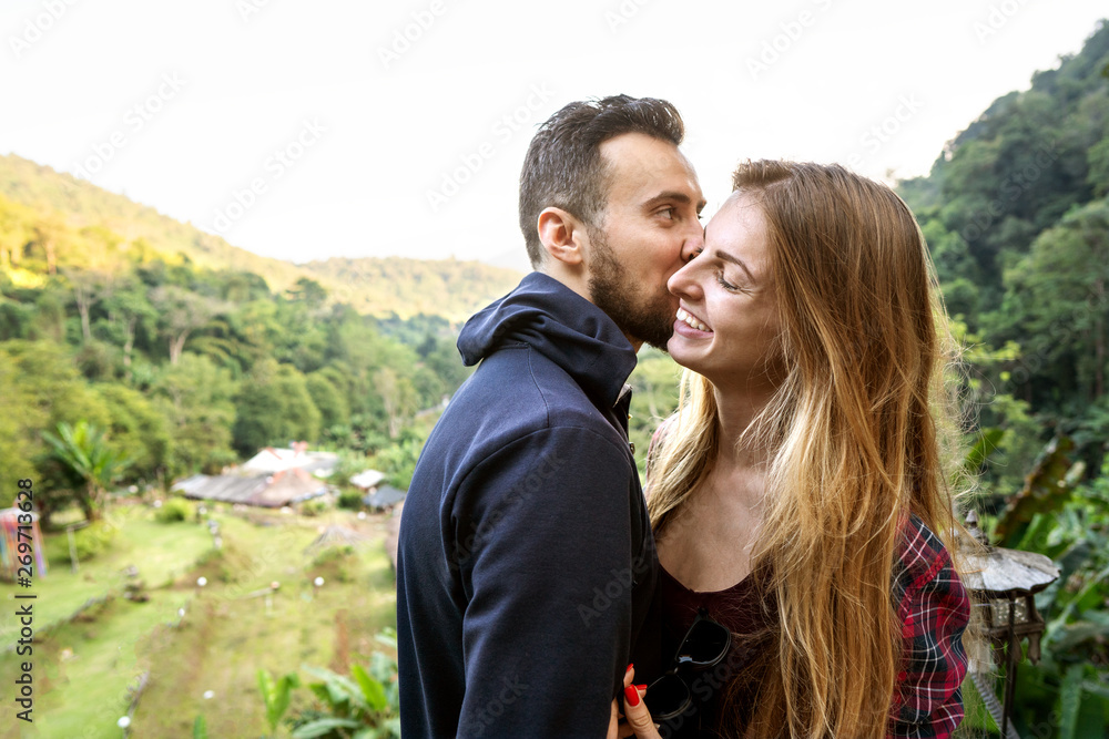 couple in love with the mountains in the tropics couple in love with the mountains in the tropics