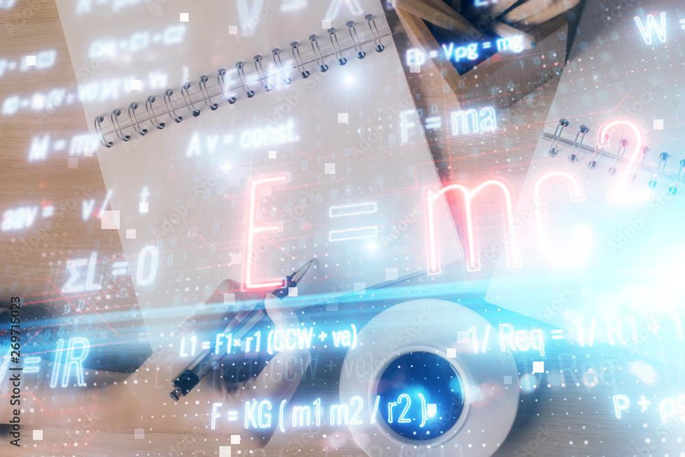 Science formula hologram over woman's hands taking notes background. Concept of study. Multi exposure Science formula hologram over woman's hands taking notes background. Concept of study. Multi exposure