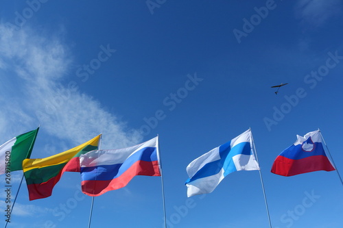 Flags of nations on a pole