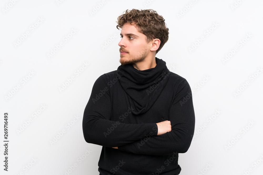 Blonde man over isolated white wall portrait Blonde man over isolated white wall portrait