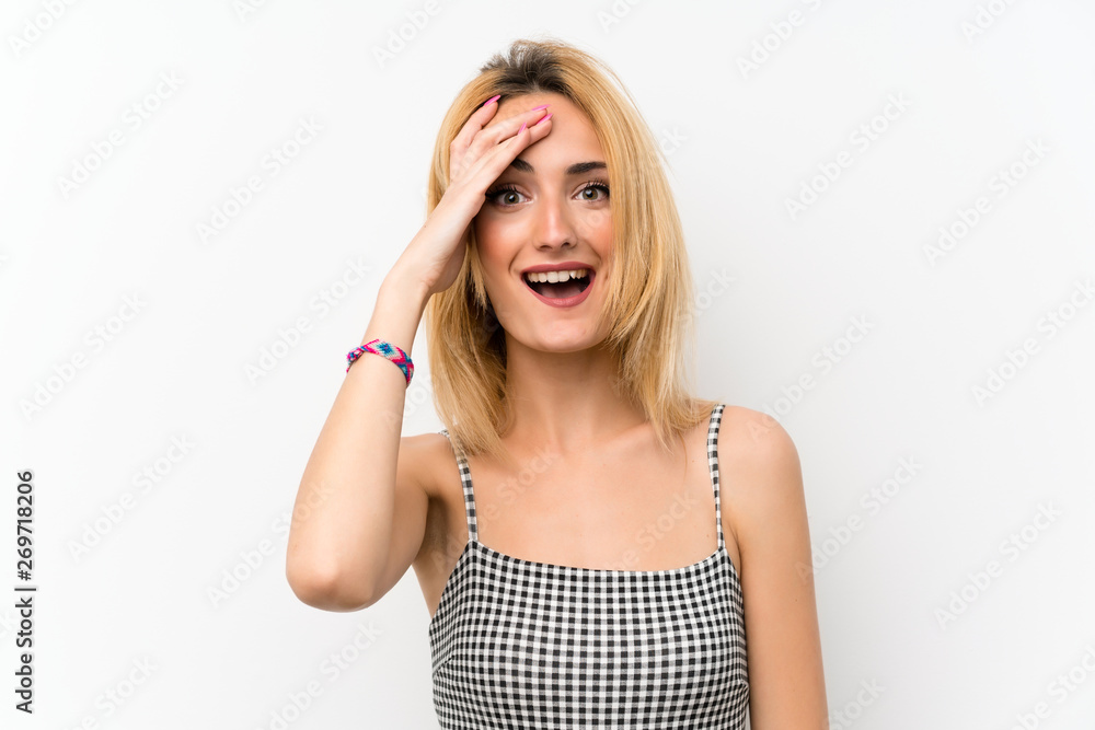 Young blonde woman over isolated white has just realized something and has intending the solution Young blonde woman over isolated white has just realized something and has intending the solution
