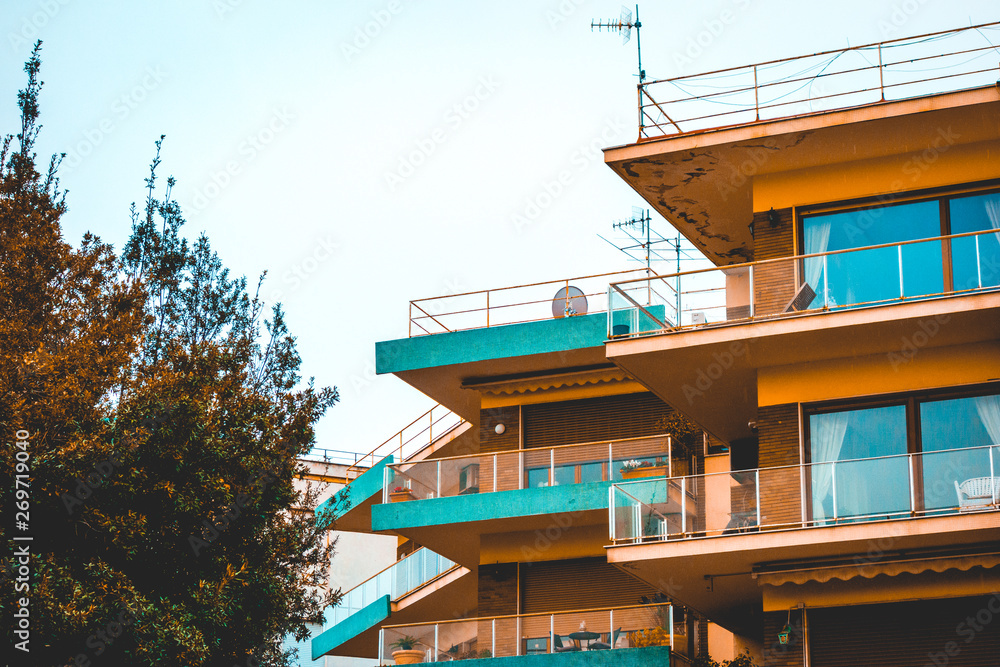 modern apartments from exterior view with orange facade