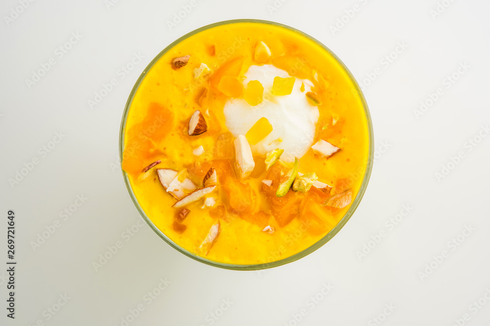 Falooda / Faluda is a popular Indian dessert - Strawberry and Mango flavoured which has Ice cream, noodles, sweet basil seeds and nuts, selective focus