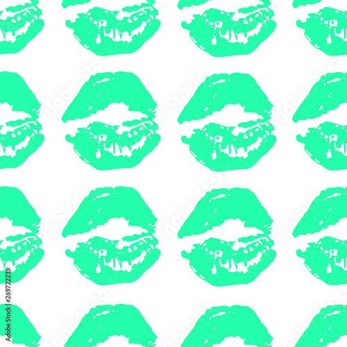 Seamless pattern of lipstick prints on a white background. Vector image.