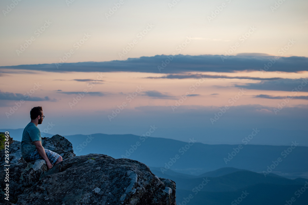 Pensive boy at dusk