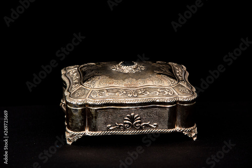 Silver vintage square jewelry box in black background