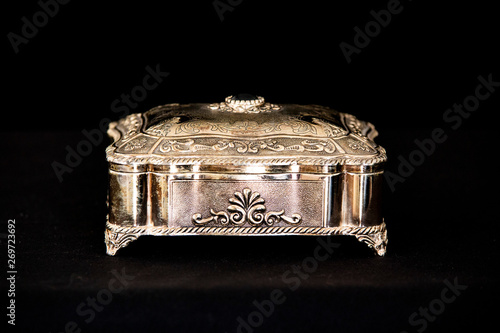 Silver vintage square jewelry box in black background