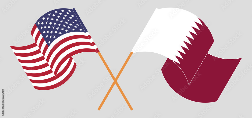 Crossed and waving flags of the USA and Qatar Crossed and waving flags of the USA and Qatar