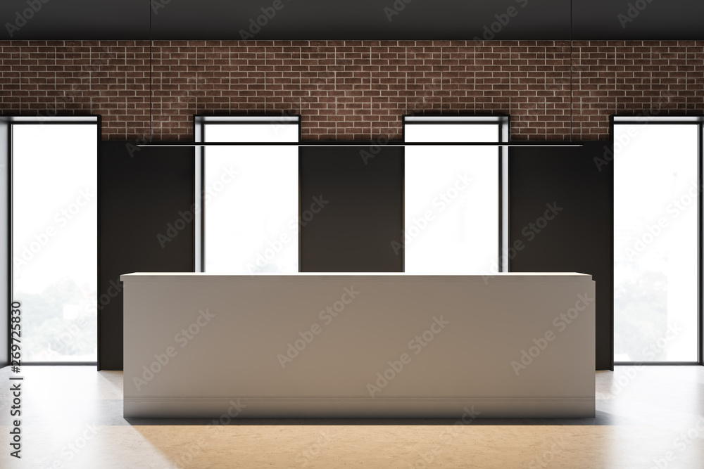 Reception in black and brick office with windows Reception in black and brick office with windows