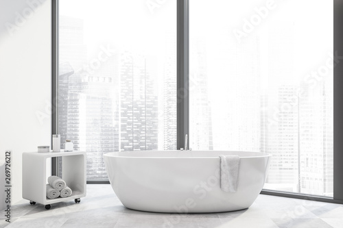 White panoramic bathroom interior with tub