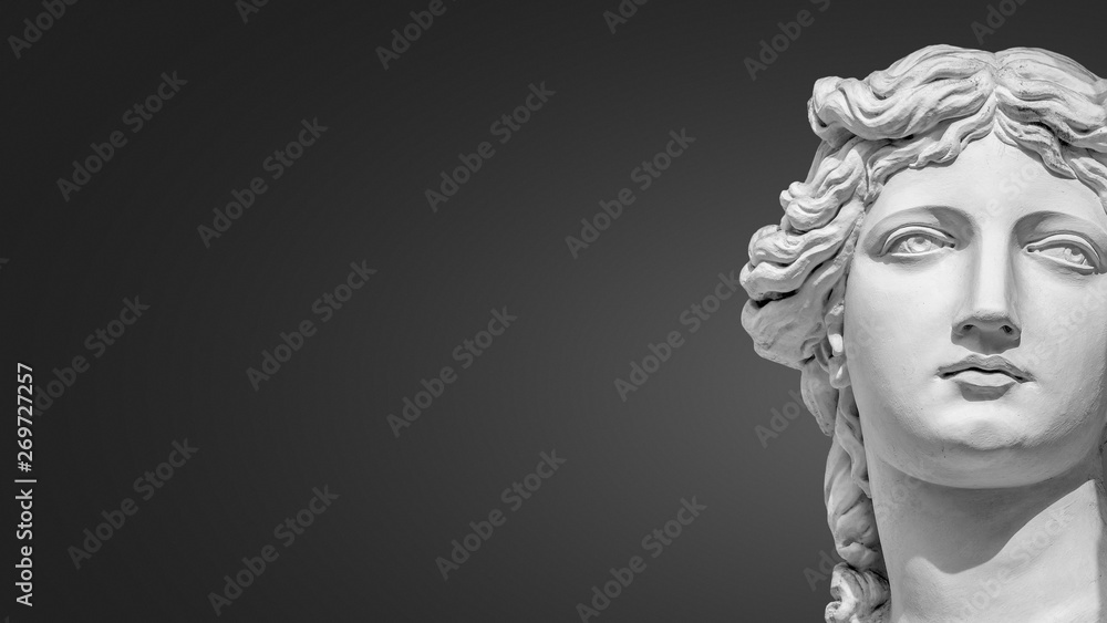 Portrait of a statue of young beautiful sensual Renaissance Era women in Vienna at smooth gradient grey background, Austria