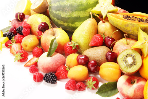 Fototapeta Naklejka Na Ścianę i Meble -  Fresh summer fruits with apple, peach, papaya, berries, pear and apricot.