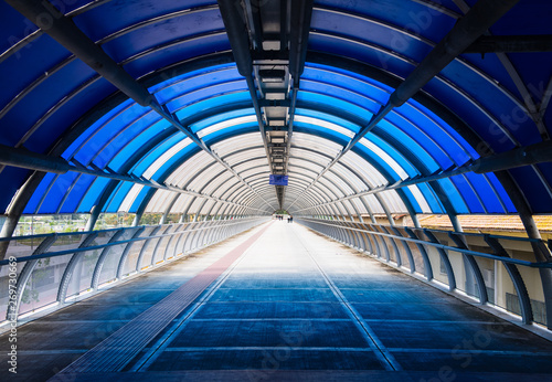 Fototapeta Naklejka Na Ścianę i Meble -  Pedestrian subway path blue modern diminishing perspective