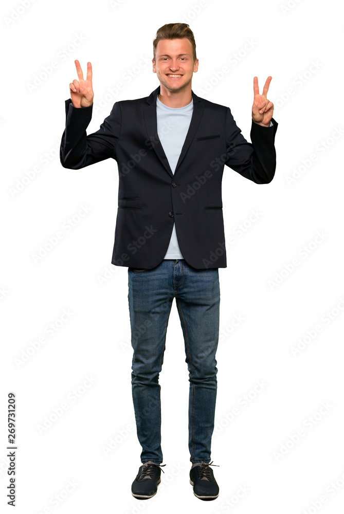 Blonde handsome man showing victory sign with both hands Blonde handsome man showing victory sign with both hands